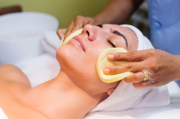 young-woman-lying-cosmetologist-s-table-during-rejuvenation-procedure_343596-71